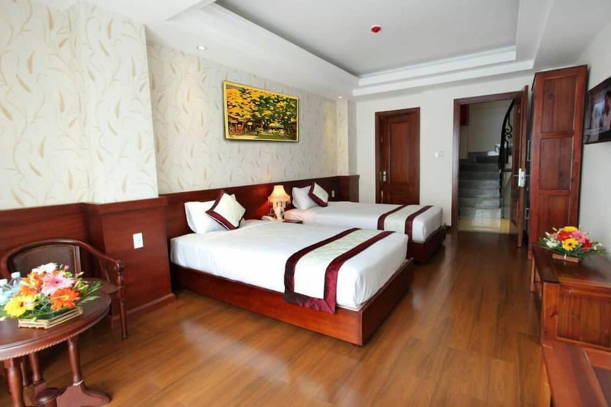 Kamar Twin Deluks | Minibar, meja kerja, dan Wi-Fi gratis