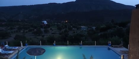 Outdoor pool, pool umbrellas, pool loungers