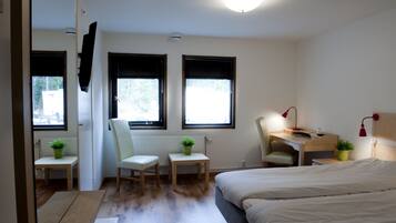 Habitación doble | Decoración personalizada y muebles diferentes