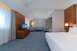 Habitación doble ejecutiva | Ropa de cama de alta calidad y minibar 