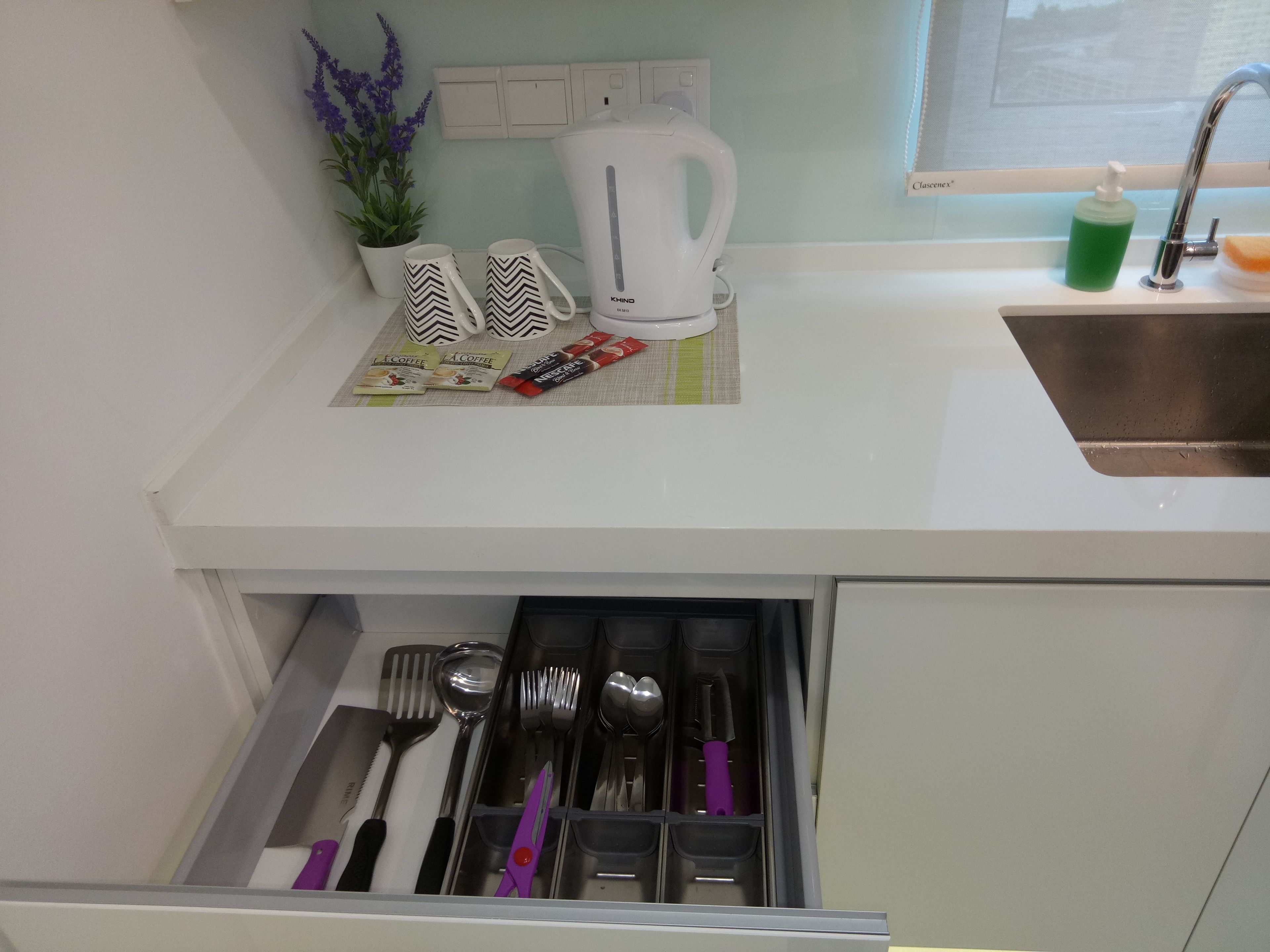 georgetown sea view suite | private kitchenette | full-sized fridge, microwave, stovetop, coffee/tea maker