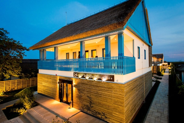 Front of property - evening/night