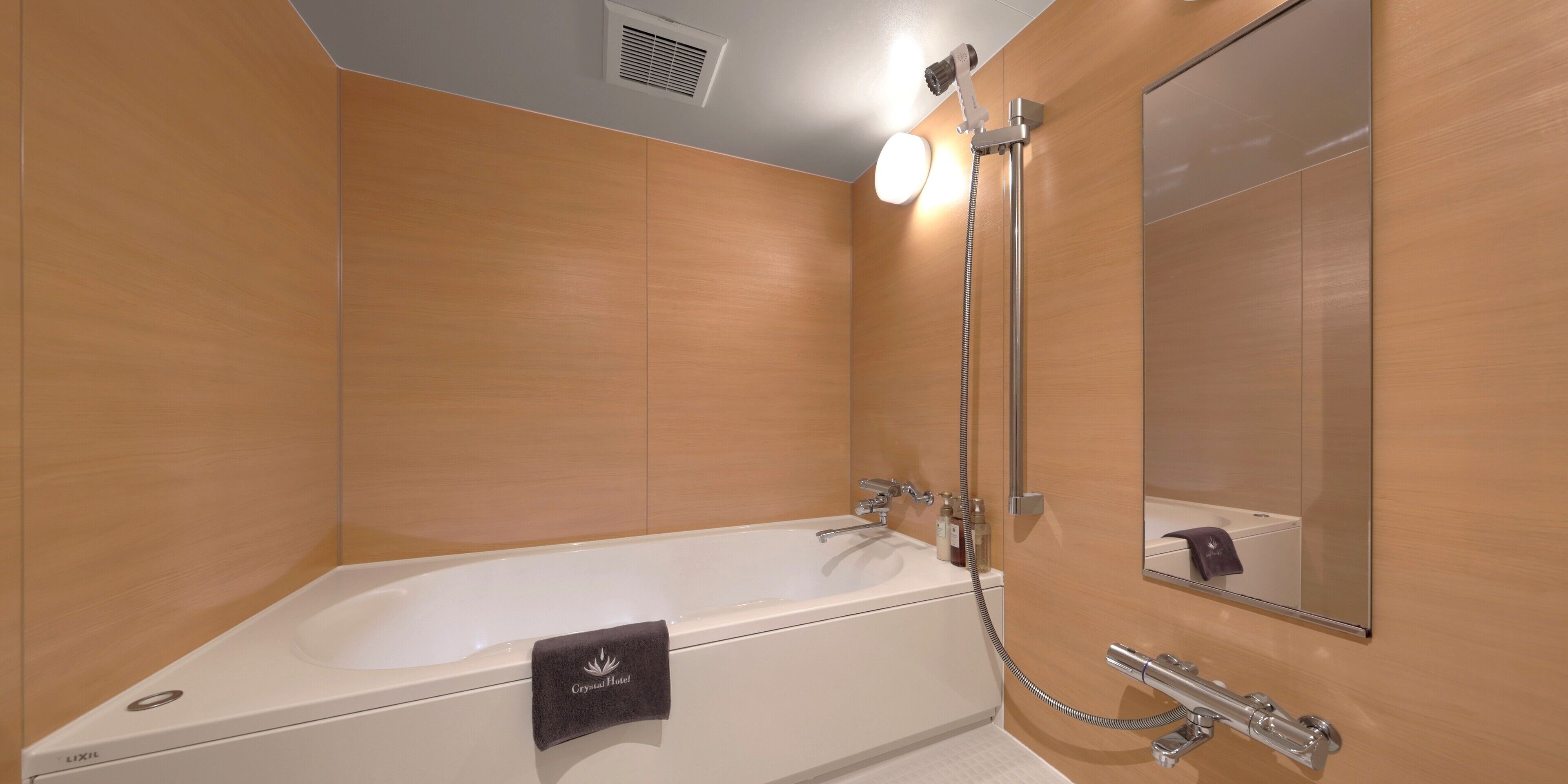 separate bathtub and shower, free toiletries, hair dryer, bathrobes