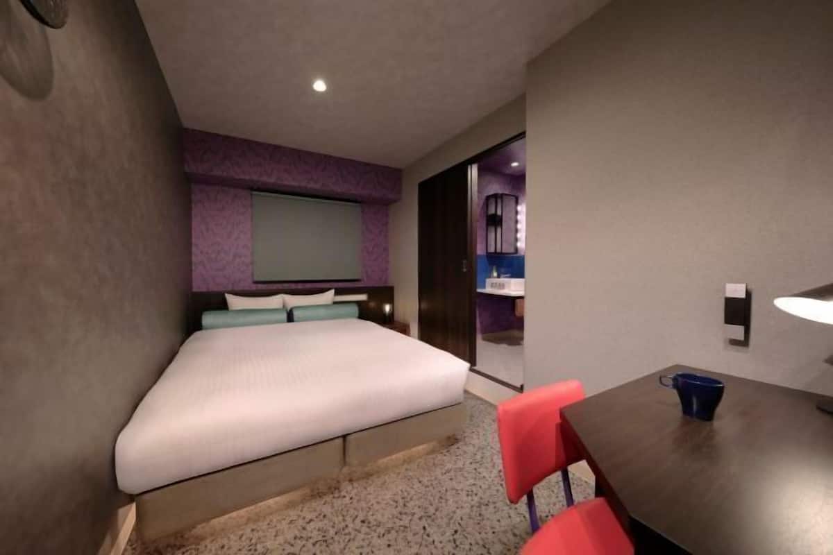 Down duvets, desk, blackout curtains, iron/ironing board