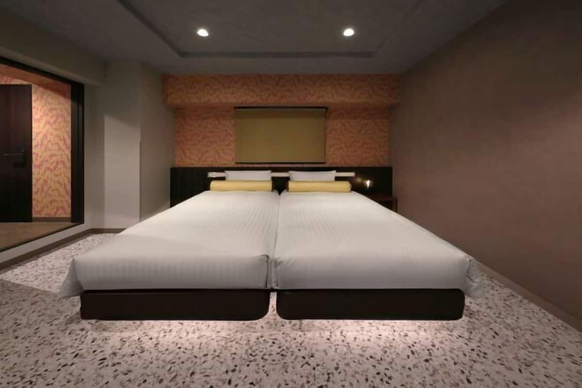 Down duvets, desk, blackout curtains, iron/ironing board