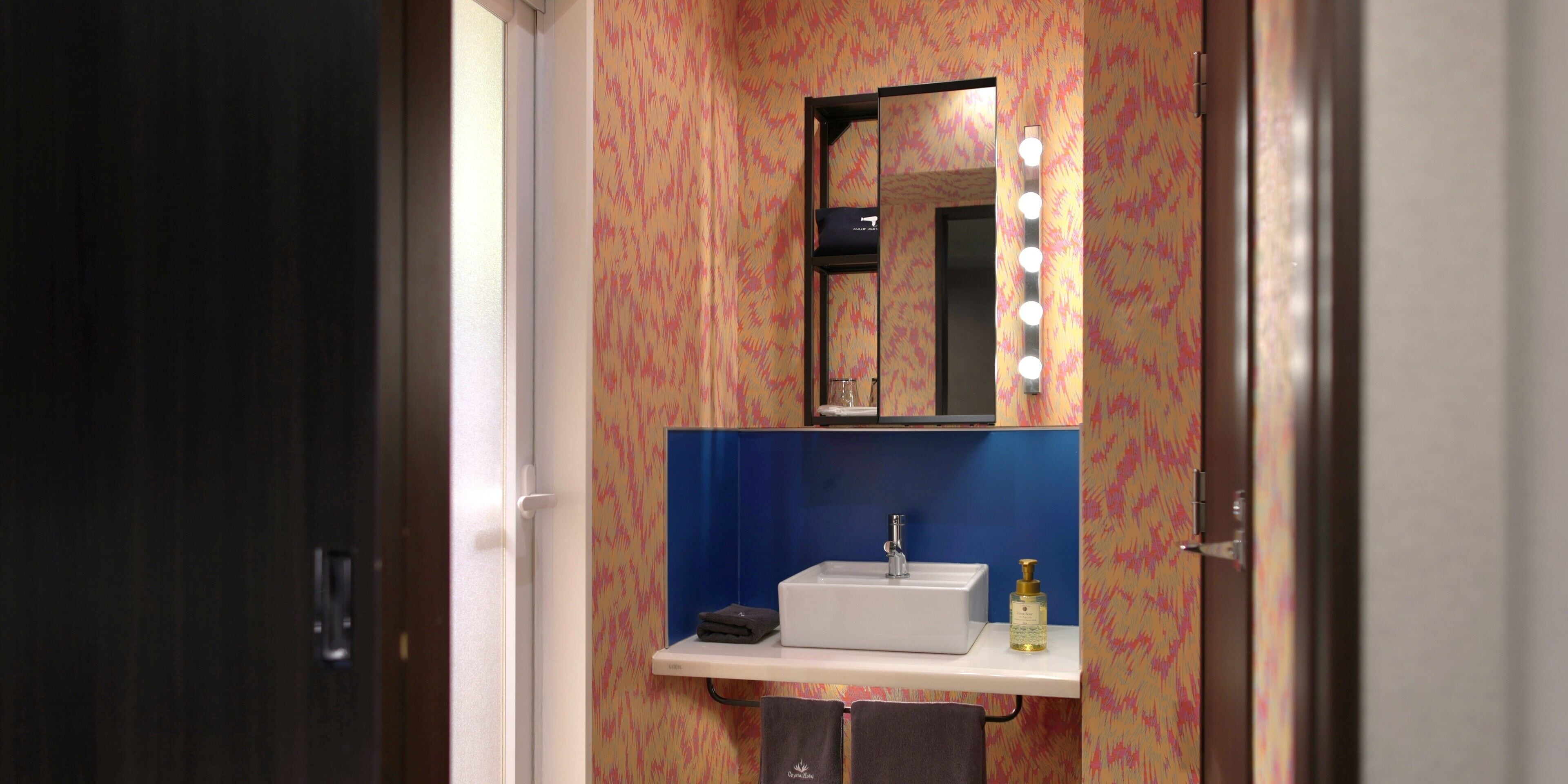 down duvets, desk, blackout curtains, iron/ironing board