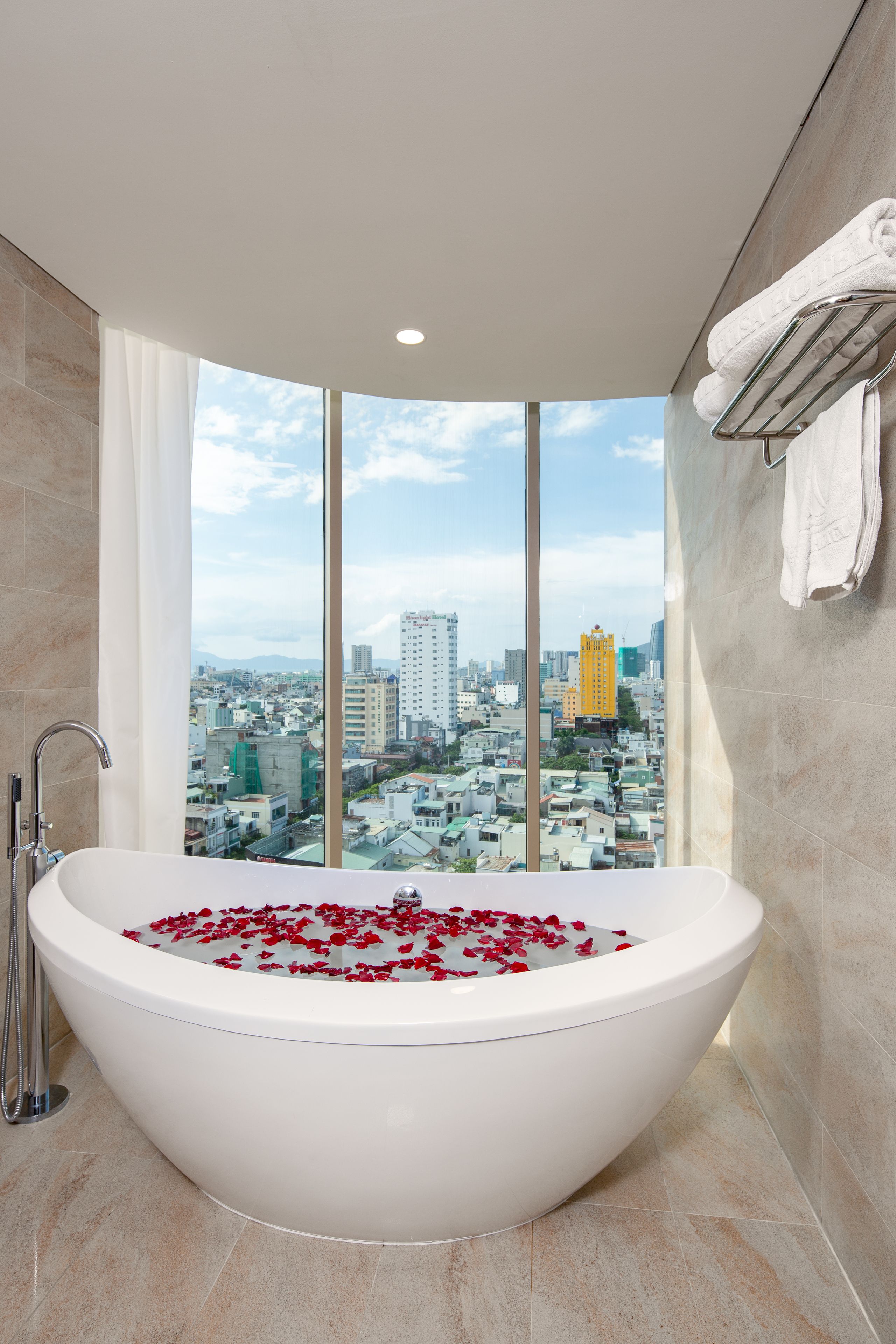 mitisa suite | bathroom | rainfall showerhead, free toiletries, hair dryer, slippers