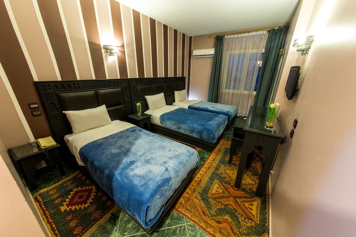 Triple Room | 1 bedroom, in-room safe, desk, cribs (surcharge)