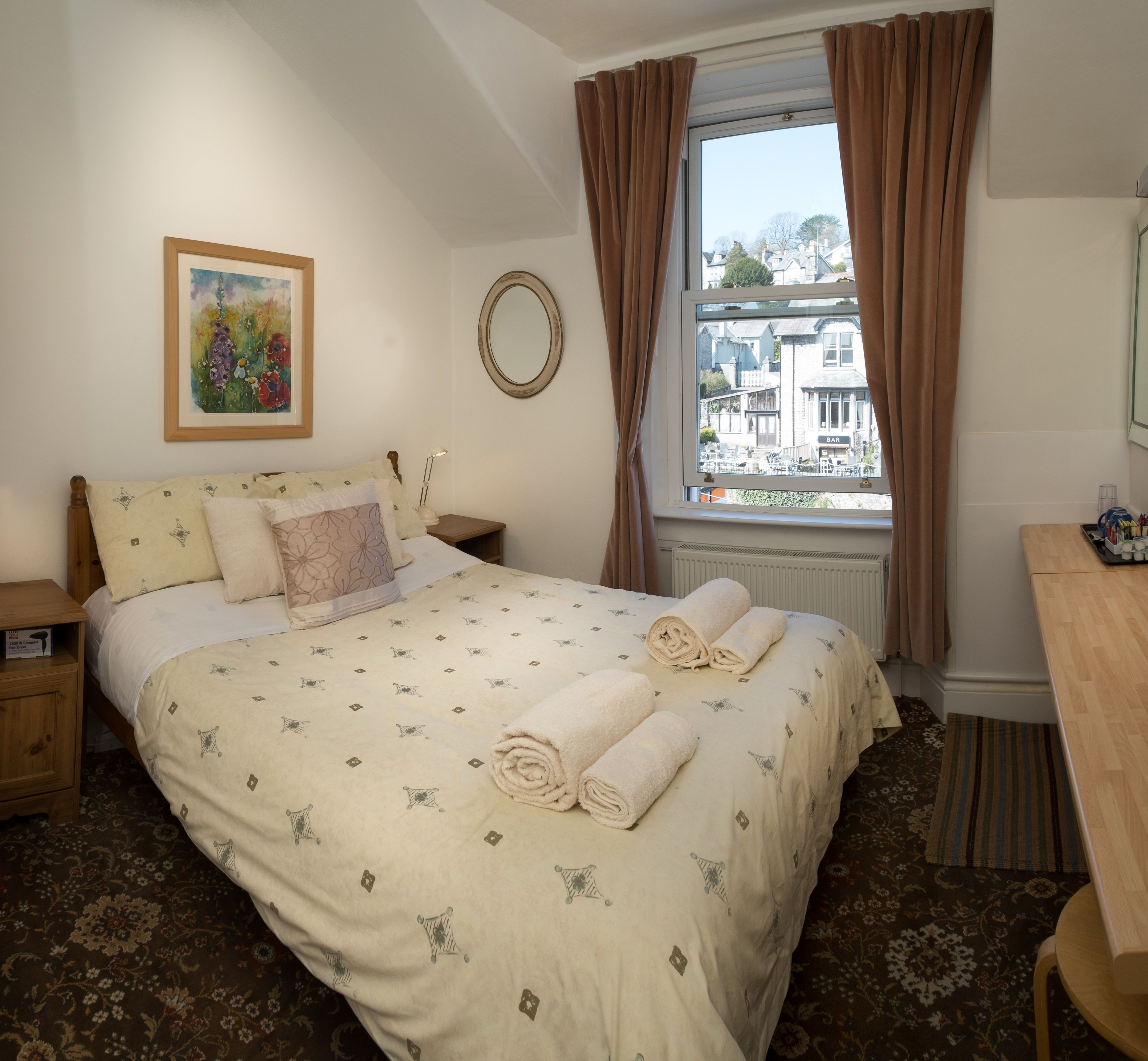 Desk, laptop workspace, blackout curtains, iron/ironing board