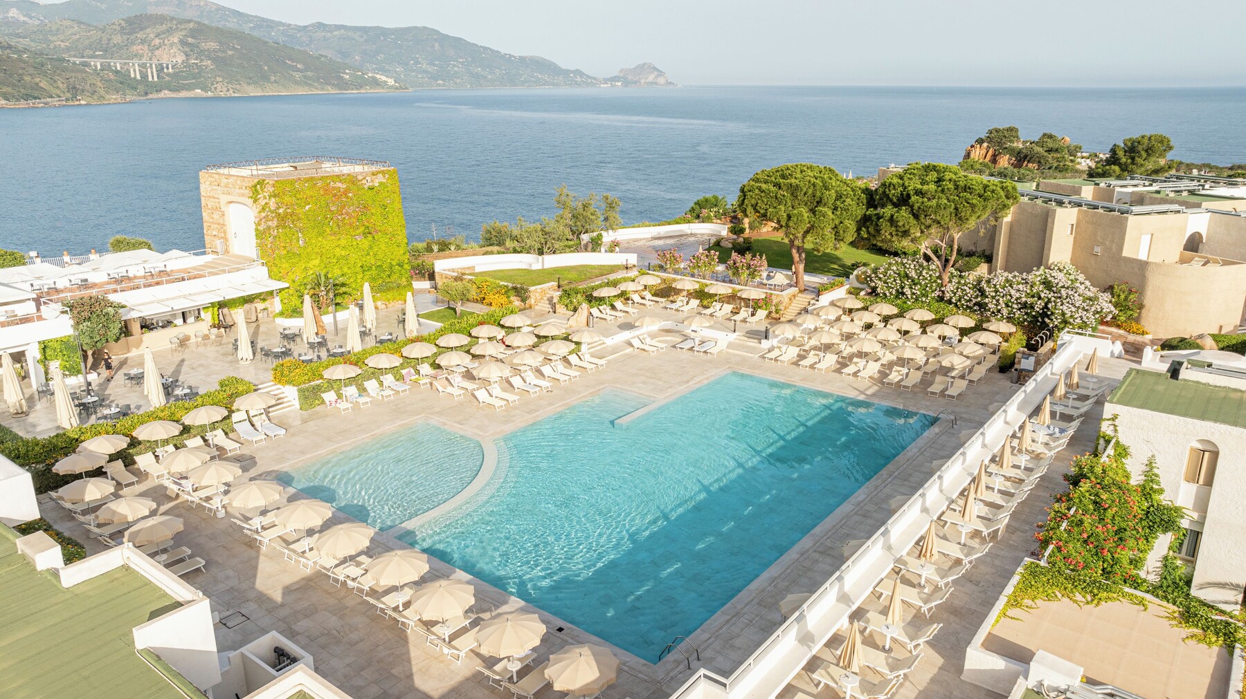 2 outdoor pools, pool umbrellas, pool loungers