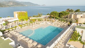 2 outdoor pools, pool umbrellas, pool loungers