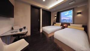 A hotel room with a bed, a desk with a chair, a TV, and a window with a city view. - RE HOTEL Tanimachi9chomeⅡ (Osaka)