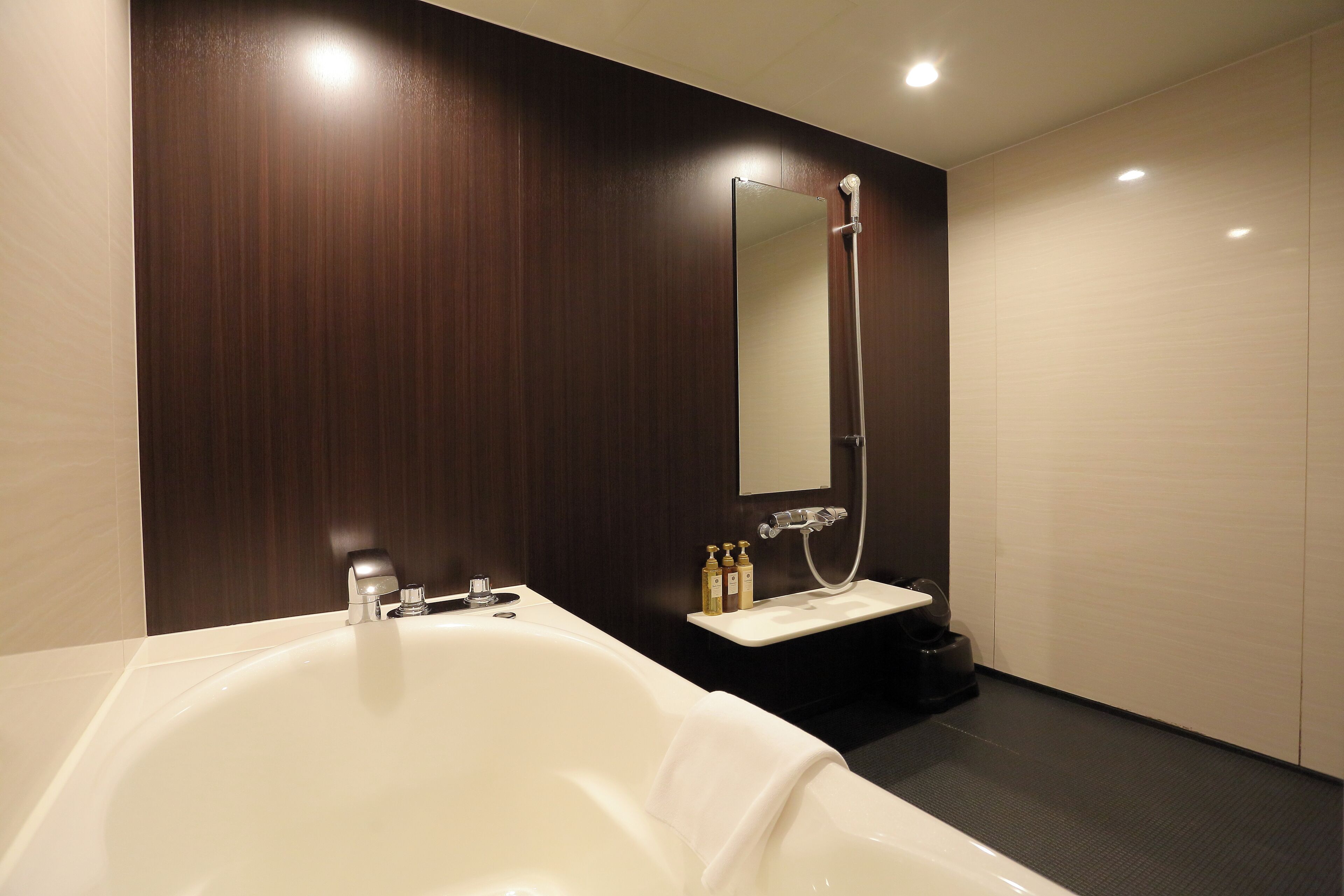 separate bathtub and shower, free toiletries, hair dryer, slippers