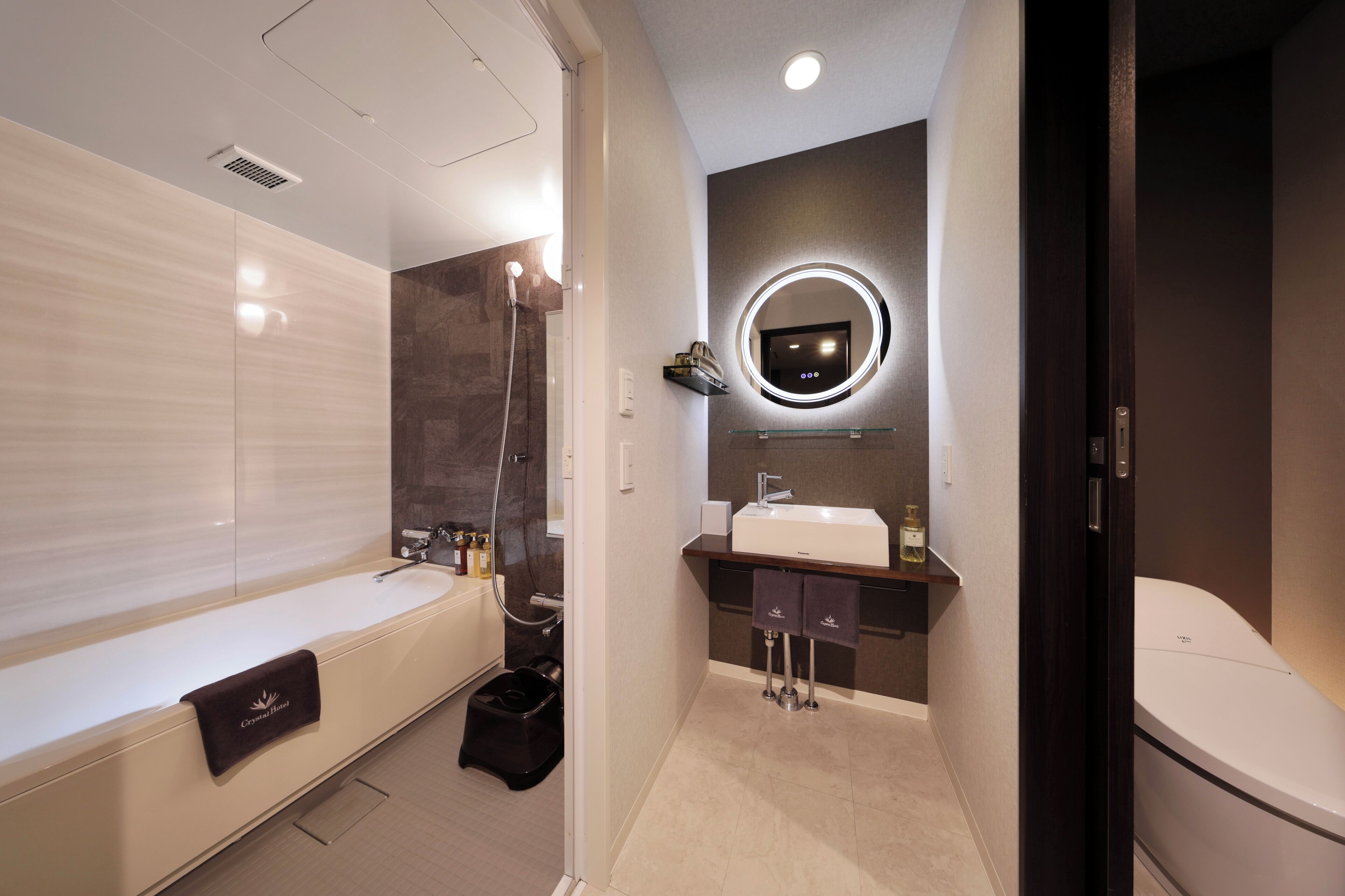 separate bathtub and shower, free toiletries, hair dryer, slippers