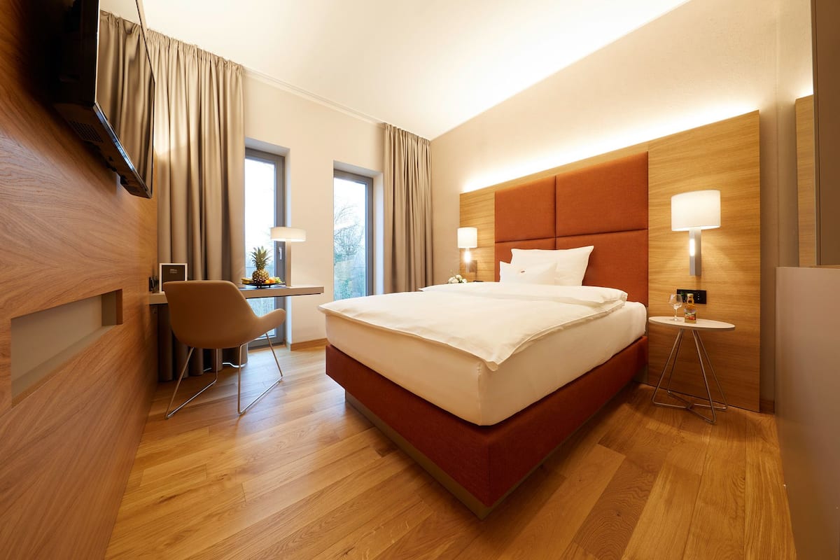 Eenpersoonskamer | 1 slaapkamer, luxe beddengoed, een minibar, een kluis op de kamer
