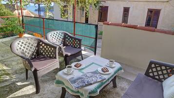 Apartment, 1 Bedroom, Terrace, Partial Sea View | Terrace/patio