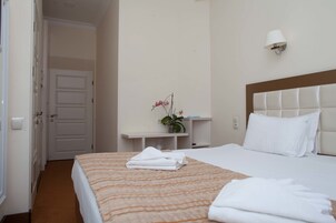 Standard Apartment | Minibar, in-room safe, soundproofing, iron/ironing board