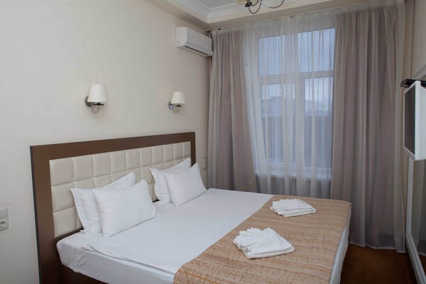 Standard Apartment | Minibar, in-room safe, soundproofing, iron/ironing board