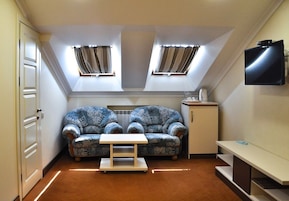 Apartamento familiar | Minibar, caja fuerte, sistema de insonorización