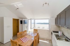 Apartment, 3 Bedrooms, Balcony, Sea View | Private kitchen | Fridge, oven, stovetop, coffee/tea maker - Apartments Villa Ari (Dubrovnik)