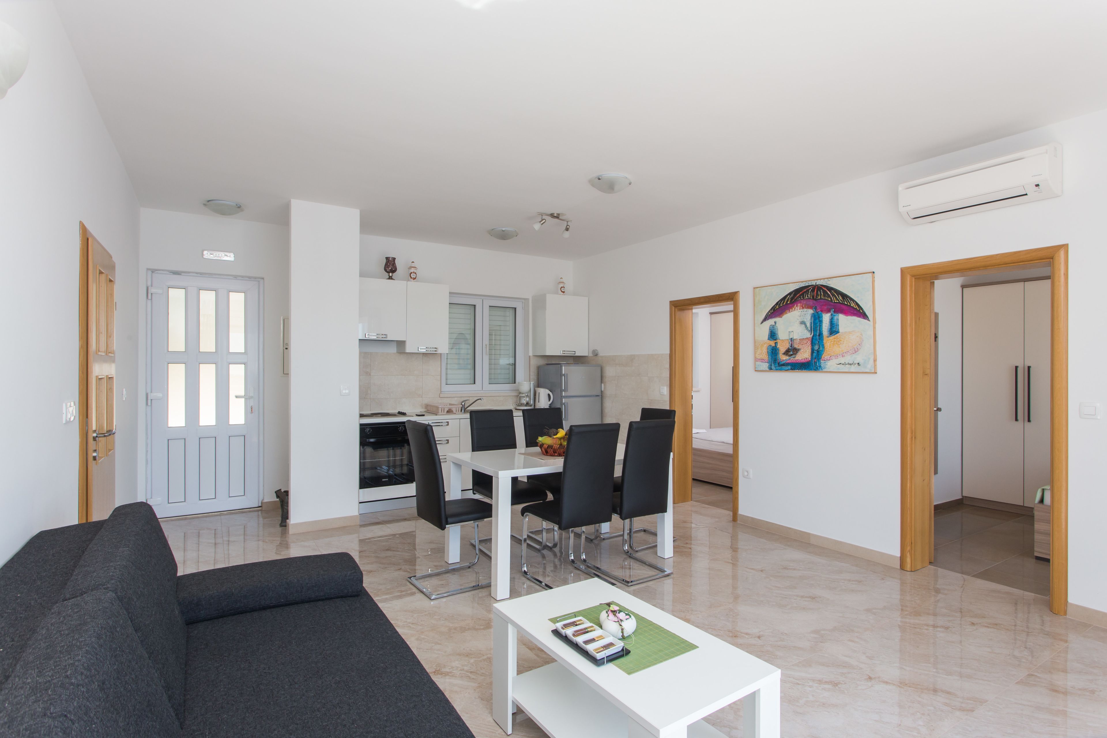 Deluxe Apartment, 3 Bedrooms, Balcony, Sea View | Living area | Flat-screen TV