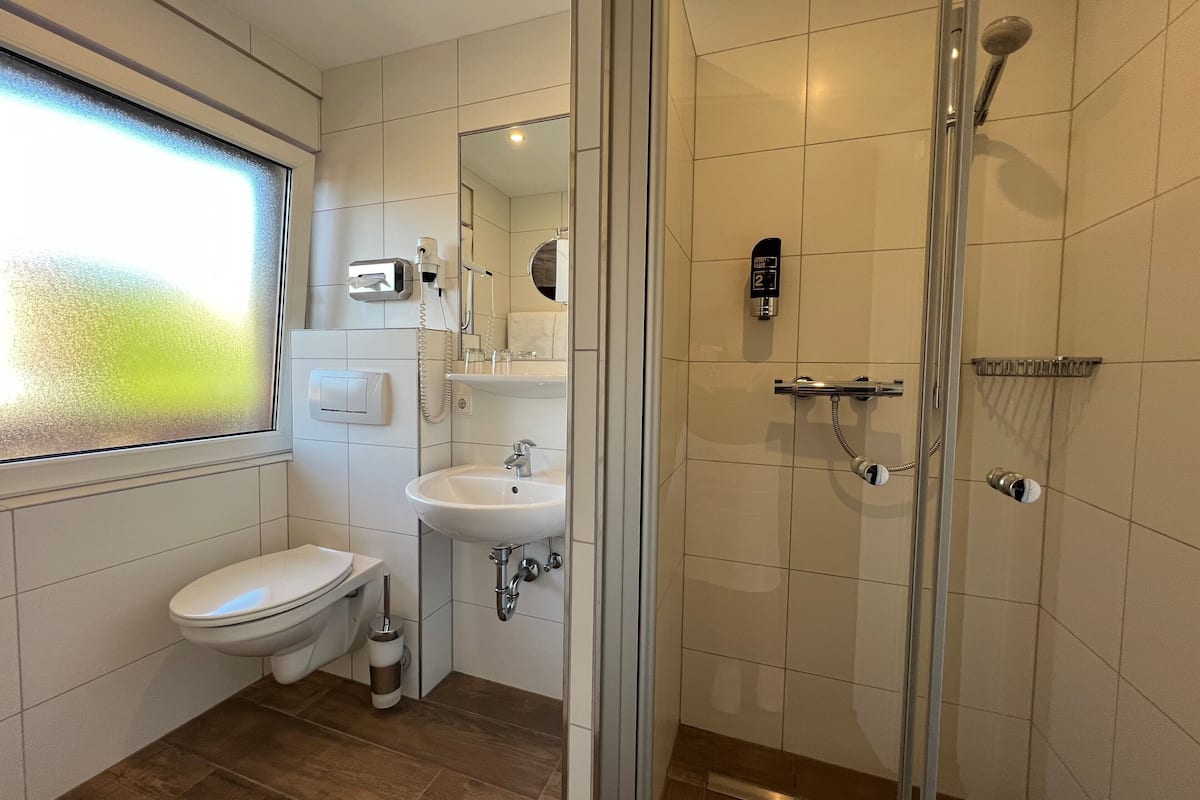 double room | bathroom | shower, hair dryer, towels
