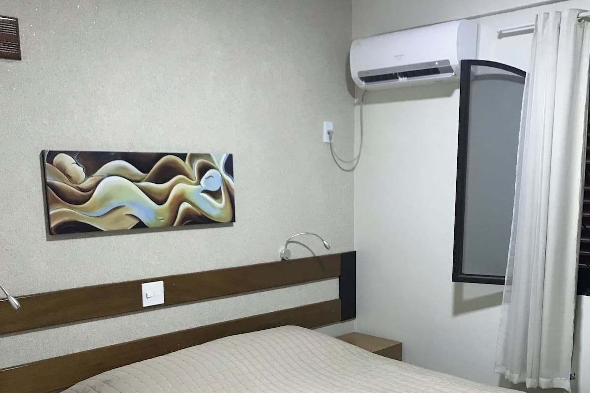 Minibar, desk, blackout curtains, iron/ironing board