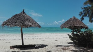 Private beach, white sand, free beach shuttle, sun-loungers