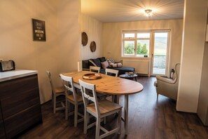 Comfort Apartment, 2 Bedrooms (Apt 20) | Living area | Flat-screen TV - Breidamyri Farm Apartments (Laugar)