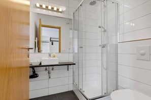 Shower, free toiletries, hair dryer, towels