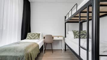 Family Room | Premium bedding, desk, blackout drapes, soundproofing