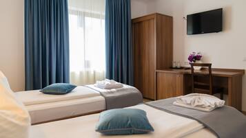 Twin Room | Desk, iron/ironing board, free cots/infant beds, free WiFi