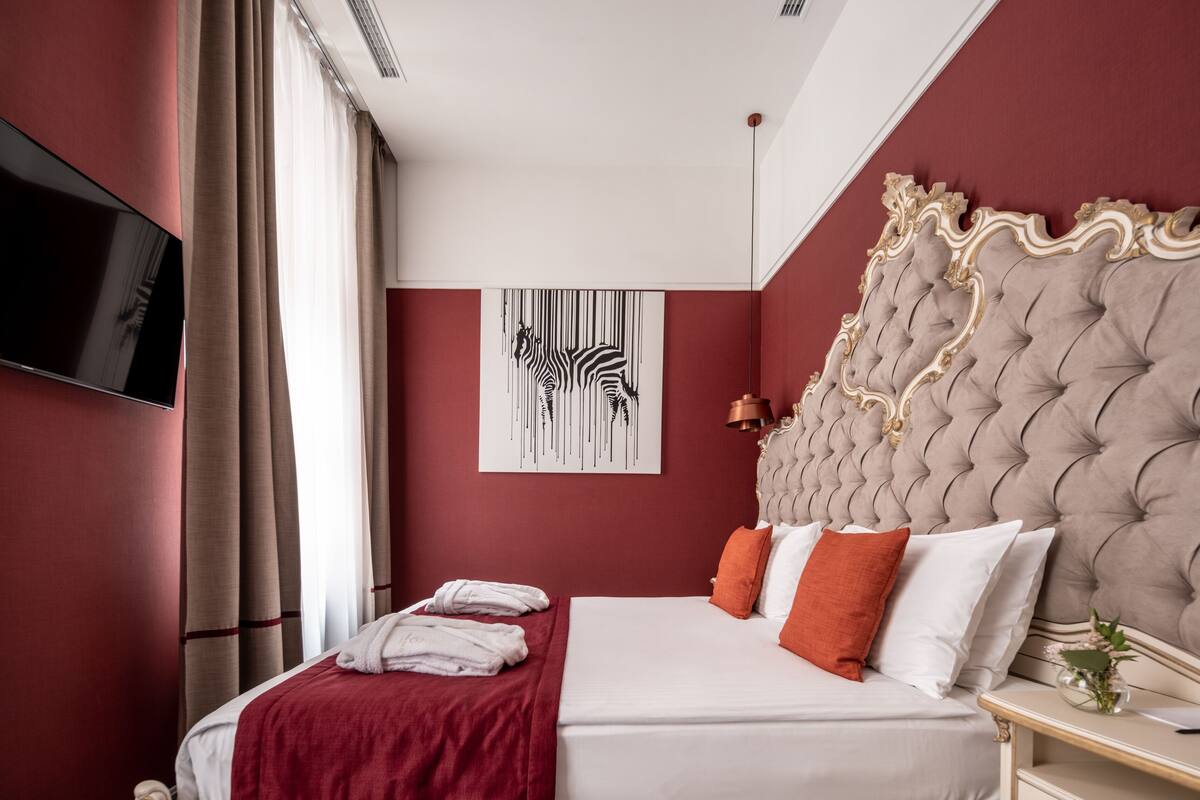 Suite junior | 1 dormitorio, ropa de cama de alta calidad, minibar y caja fuerte