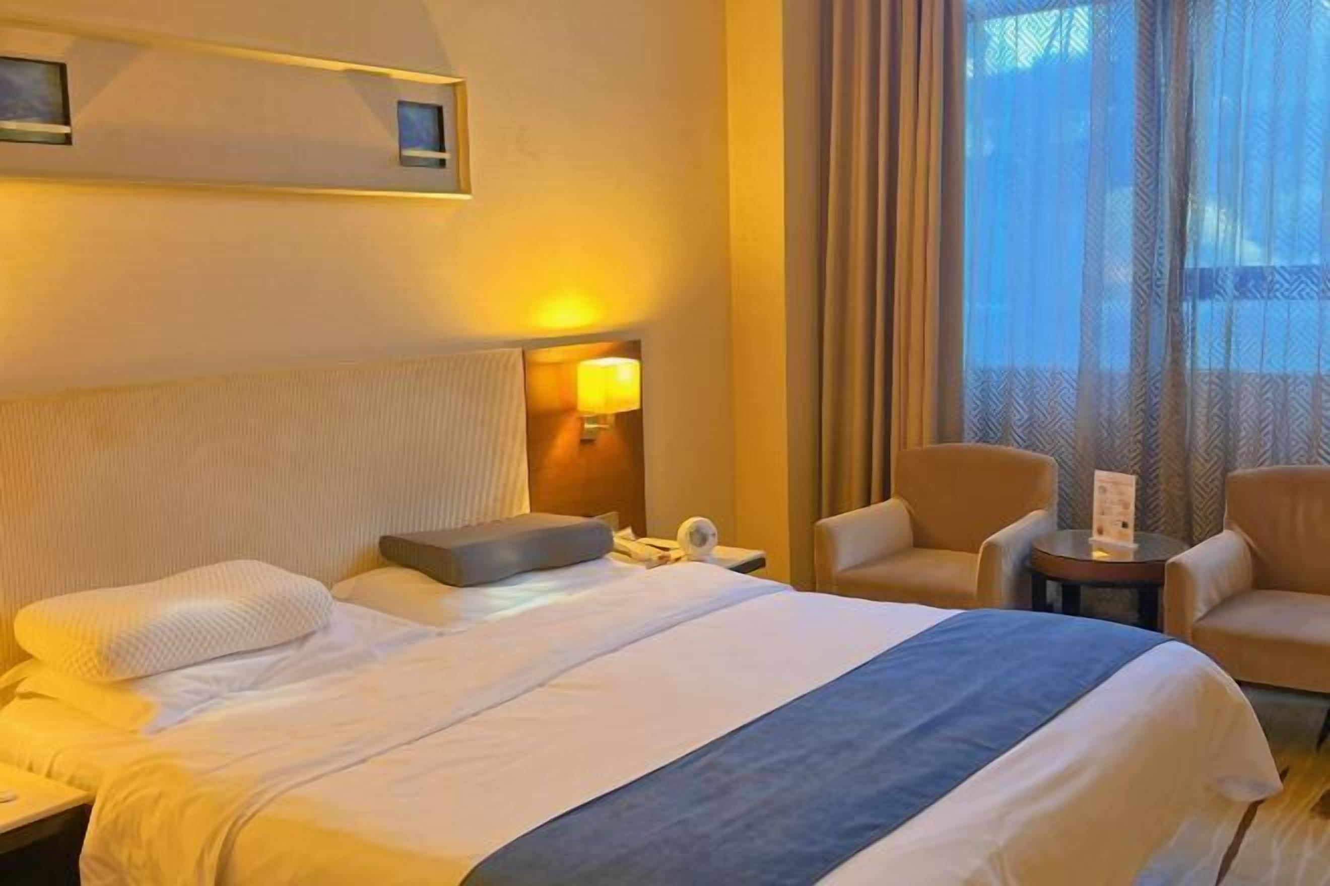 Desk, blackout curtains, rollaway beds, free WiFi