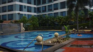 Outdoor pool, open 8 AM to 10 PM, pool umbrellas, sun loungers