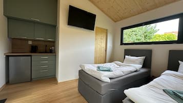 Estudio superior | Minibar, espacio para trabajar con laptop y cortinas blackout