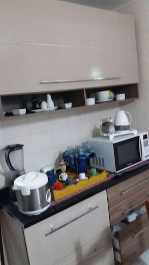 Fridge, microwave, cookware/dishes/utensils