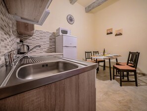 Apartment, 2 Doppelbetten, Erdgeschoss | Wohnbereich