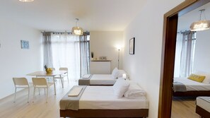 Apartment | Premium bedding, iron/ironing board, free cribs/infant beds, free WiFi