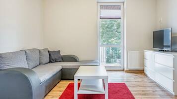 Premium Suite, 1 Bedroom, Non Smoking, Kitchenette | Living room | Flat-screen TV