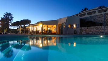 2 outdoor pools, open 9 AM to 7 PM, pool umbrellas, pool loungers