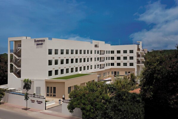 A modern hotel with a flat roof, multiple balconies, and a central courtyard. - Fairfield by Marriott Coimbatore (Coimbatore)