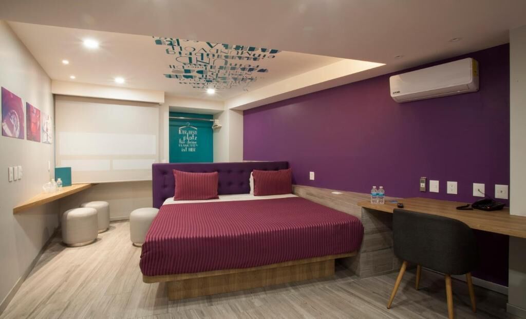 business quadruple room | 1 bedroom, select comfort beds, in-room safe, individually decorated