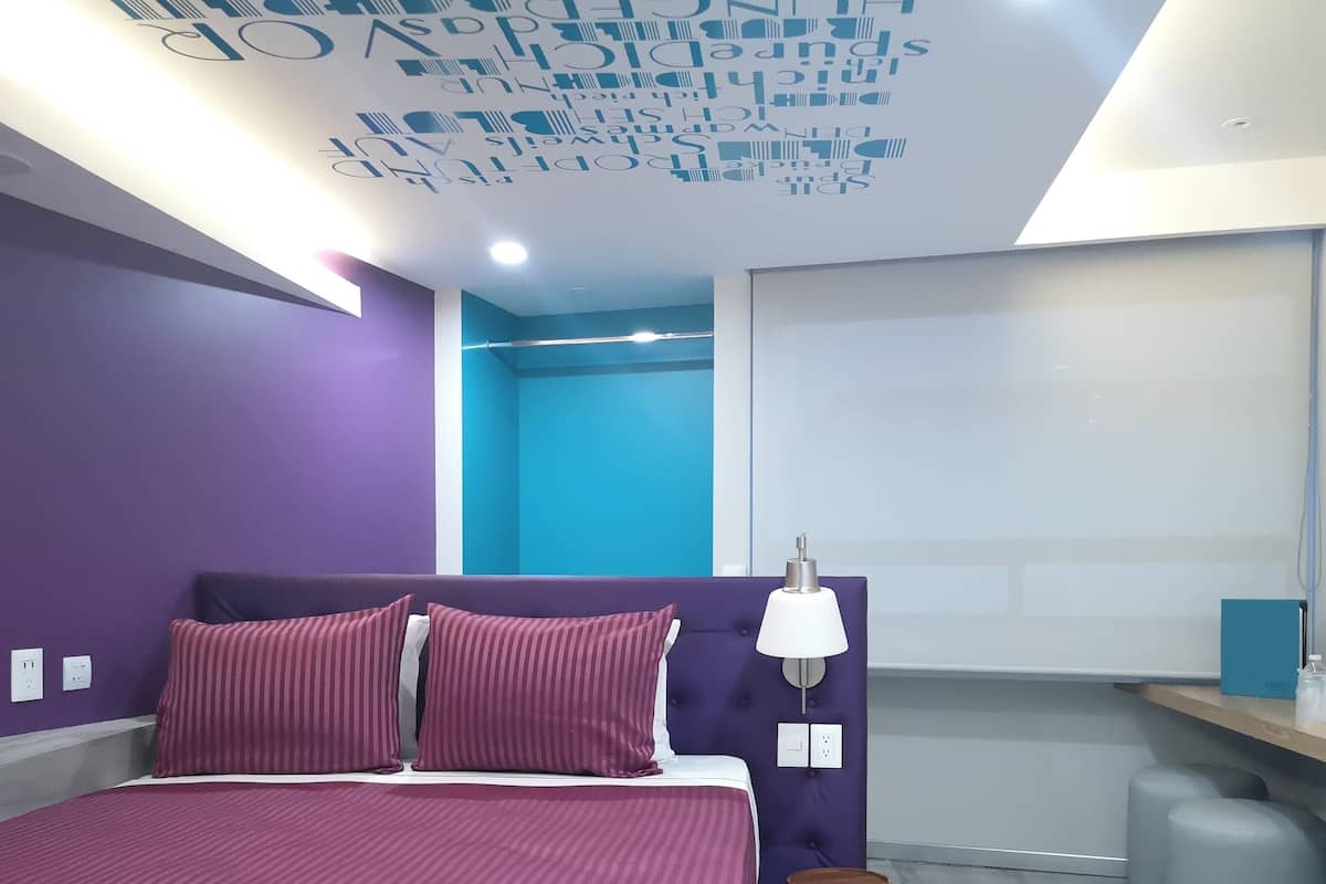 Business kamer | Select Comfort-bedden, een kluis op de kamer, individueel gedecoreerd
