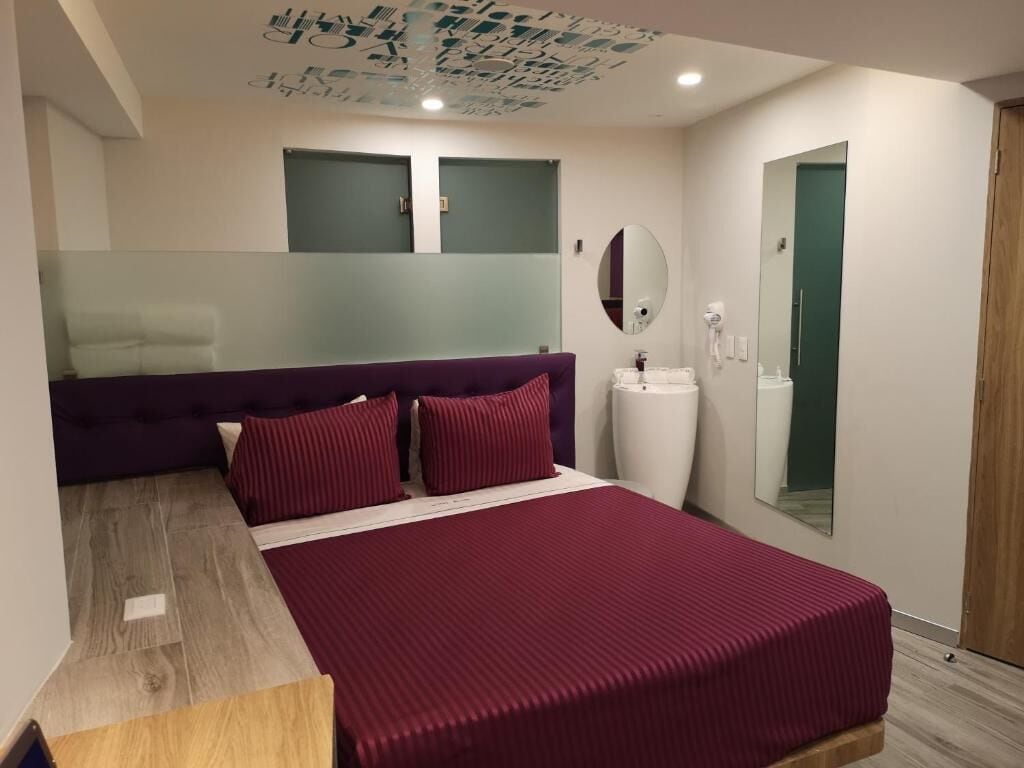 business quadruple room | 1 bedroom, select comfort beds, in-room safe, individually decorated