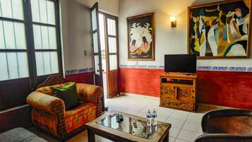 Superior Apartment, 2 Bedrooms | Living room | TV
