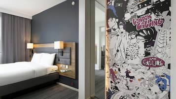 ملاءات للفراش لا تسبب الحساسية ومكتب وتجهيزات عازلة للصوت ومكواة/لوح كي