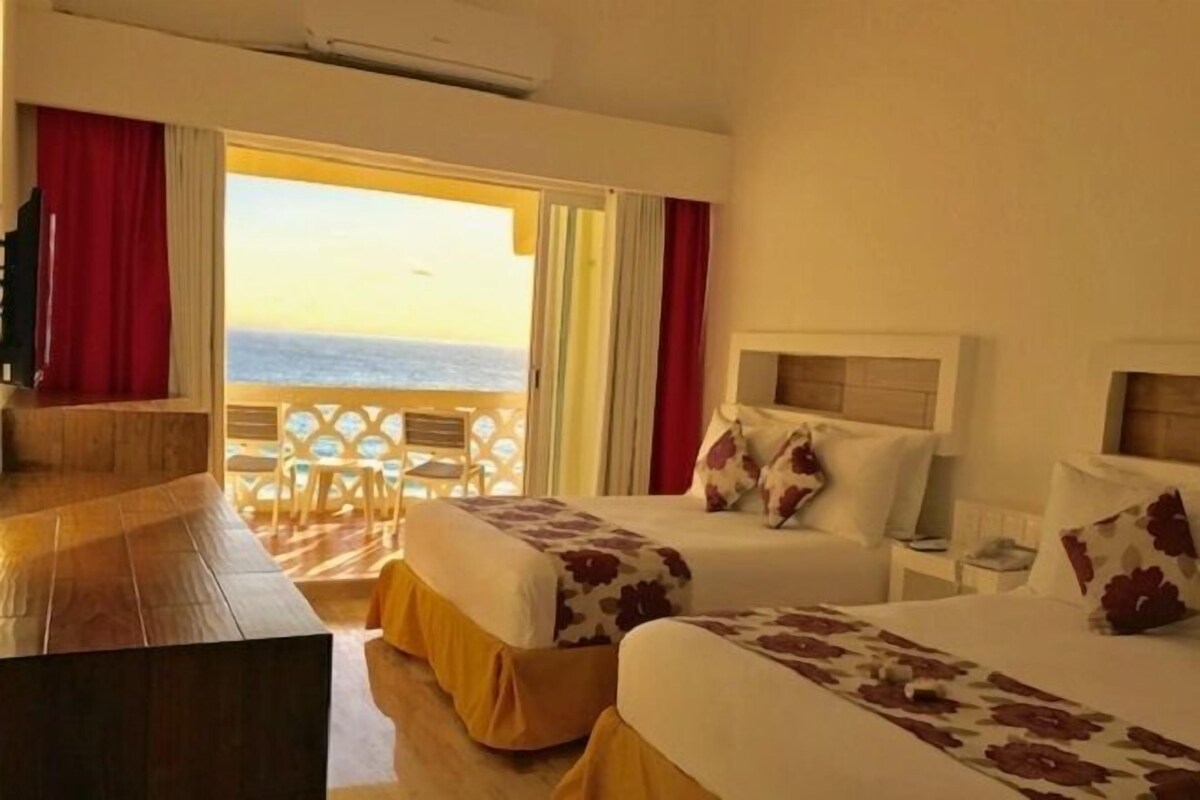 Premium bedding, memory foam beds, minibar, in-room safe