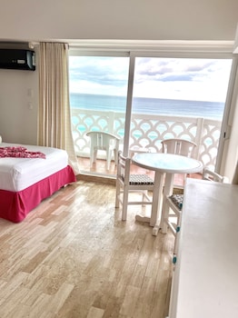 Panoramic Studio, Balcony, Sea View | Premium bedding, pillowtop beds, in-room safe, individually decorated at Ocean View Apartments – Delicia
