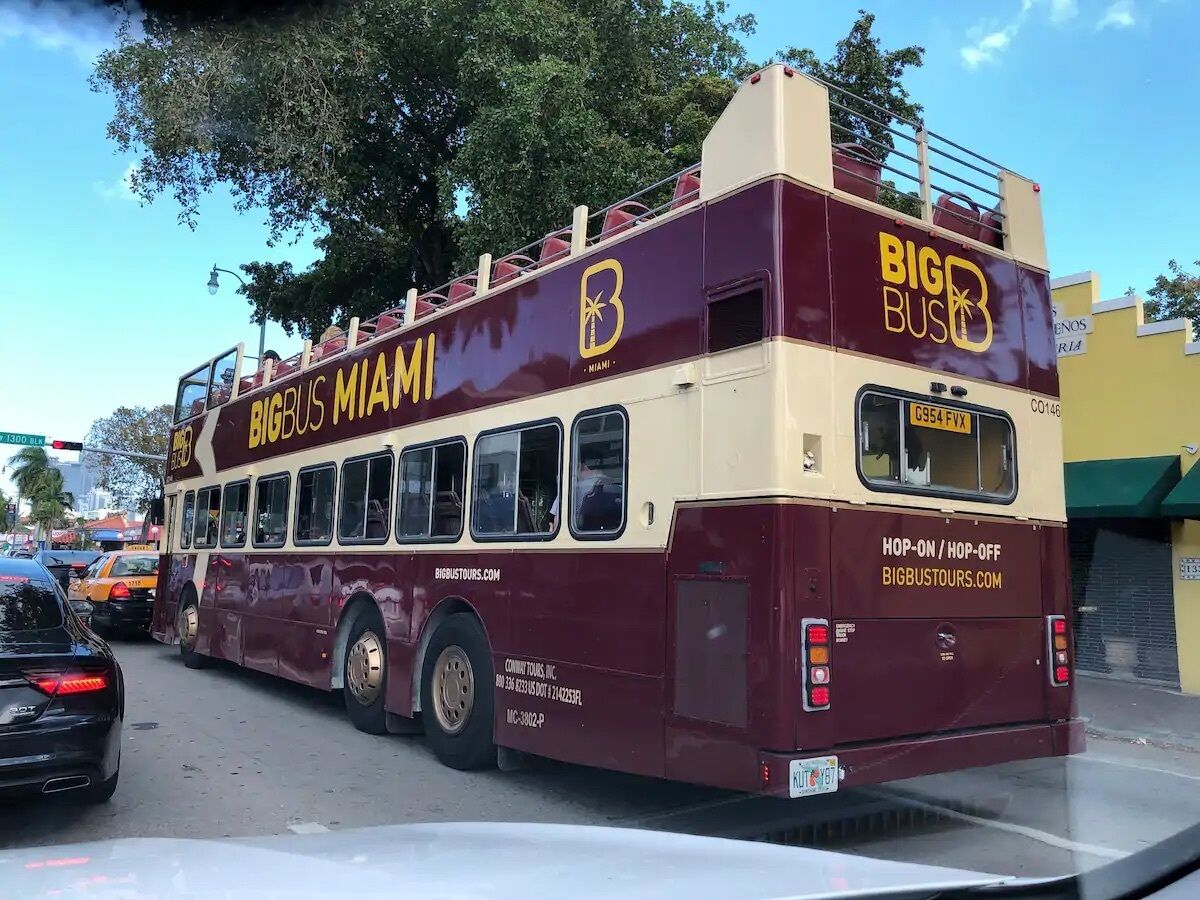 A double-decker bus with "BIG BUS MIAMI" branding, indicating a tour service.